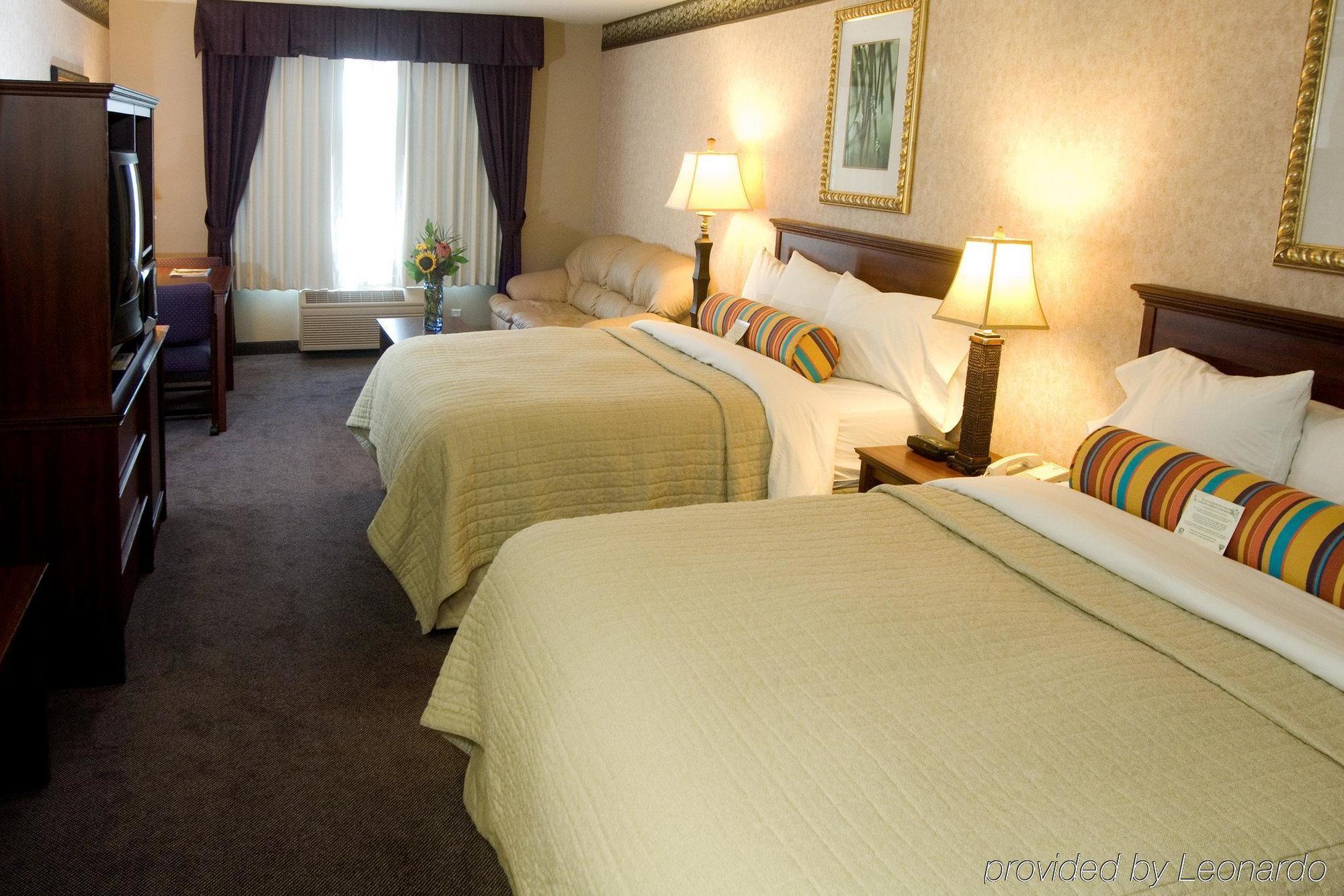 Phoenix Inn Suites Олбани Номер фото