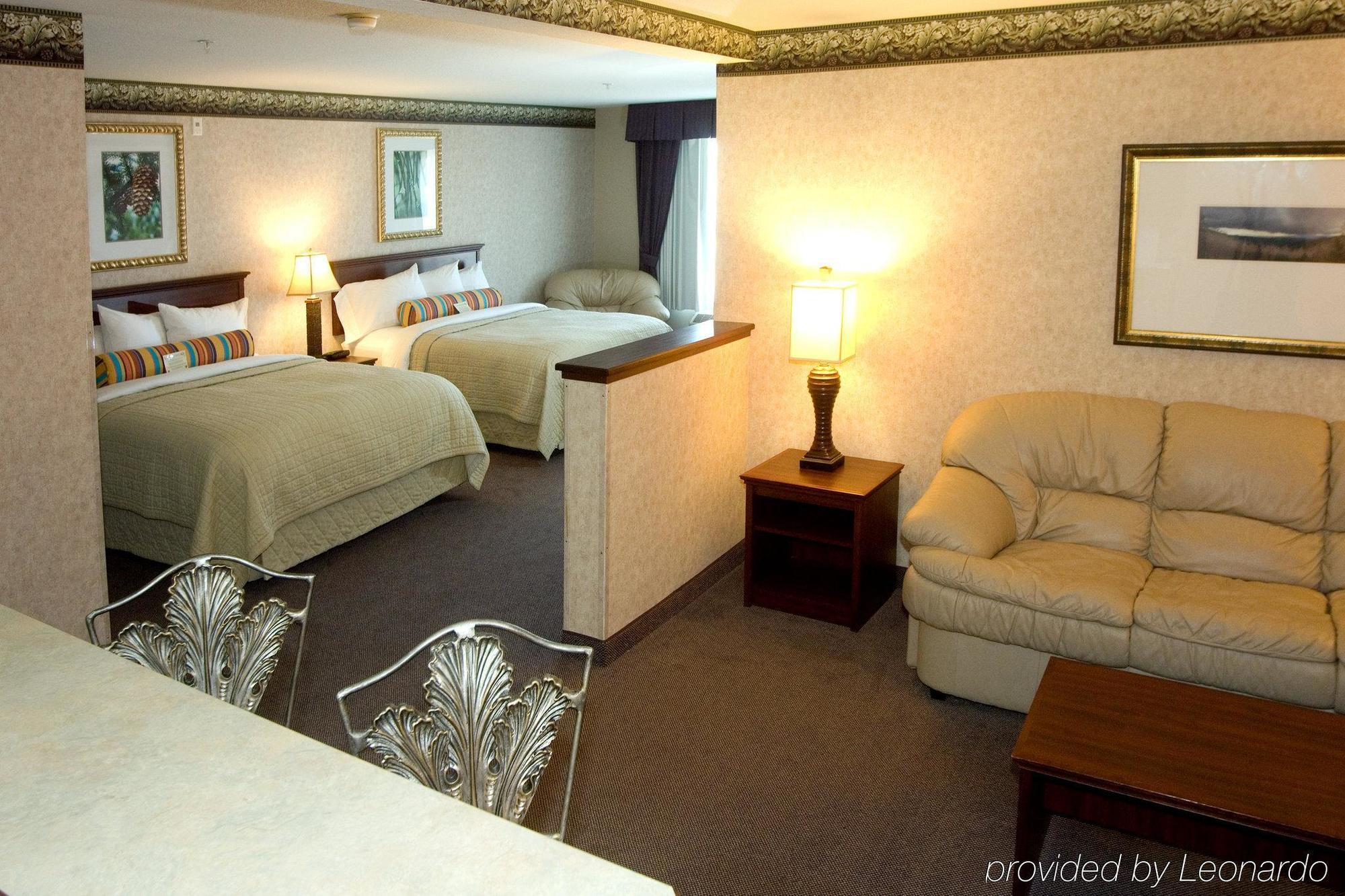 Phoenix Inn Suites Олбани Номер фото